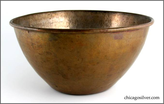 Kalo bowl, copper, massive, round, with flat bottom, flaring sides, applied wire to rim, substantial amount of remaining silvering inside.  A heavy, monumental piece.  14-1/4" W and 7-1/8" H.  Marked:  KALO