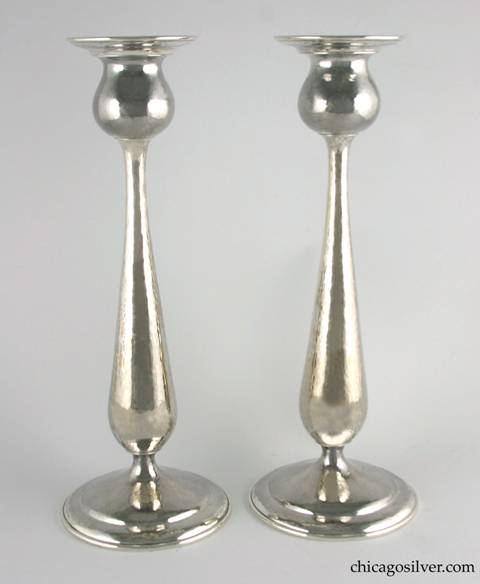 Kalo candlesticks, tall, pair (2), with pedestal base, flat bottoms, and stepped circular foot, in tulip form with broad flange at top.  Very nice hammering.  12-1/2" H and 4-3/4" W at bottom, 3-3/16" W at top.  Marked:  STERLING / HAND WROUGHT / AT / THE KALO SHOP / GS