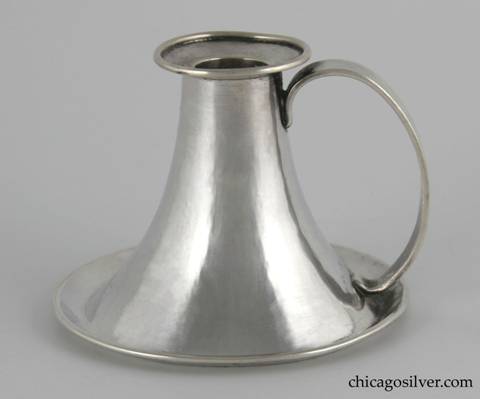 Kalo chamberstick, early, handwrought in sterling silver with round base, tapered body and looping strap handle.  3-1/8" H and 4" W.  Marked:  KALO / STERLING / 8552