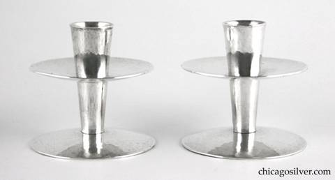 Kalo candlesticks, pair (2), hammered surface with flared cylindrical bodies with broad disk bases and wax catches.  Modern styling.  3" H and 3" W.  HAND / WROUGHT / STERLING / KALO / 15