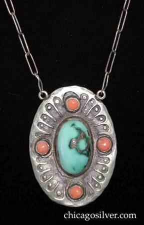 Forest Craft Guild pendant on paperclip chain, silver, oval, centering large oval bezel-set turquoise cabochon stone with four small round bezel-set coral cabochon stones above and beside it.  