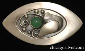 Foss brooch, oval, with pointed ends, wide raised edge, applied stylized tulip, silver beads and wirework ornament, oxidized background, and round bezel-set green agate  stone.  