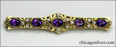 James Winn bar pin, gold, with five evenly spaced oval bezel-set cabochon amethysts faceted on the back, surrounded by 16 small round bezel-set faceted diamonds