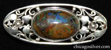 Frank Gardner Hale brooch / pin, oval frame in sterling silver with fine, detailed foliate work with handwrought flowers, beads and scrolls centering an oval, bezel-set opal in matrix cabochon.