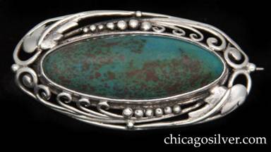 Frank Gardner Hale brooch / pin, oval frame in sterling silver with pattern of leaves, vines, beads and curving wirework top and bottom centering an oval cabochon bezel-set dark blue-green mottled turquoise stone