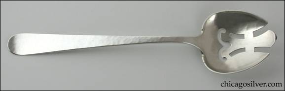 Hanck serving spoon with geometric pierced end.  