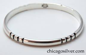 Kalo bracelet, bangle, with repeated chased pattern of four vertical lines