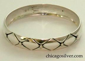 Kalo bracelet, bangle, wide, convex surface with long chased diagonal grooves forming pattern of four diamonds on each side and a silver beads at the side point of each diamond (ten beads total)