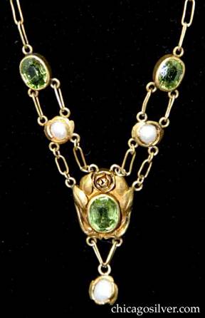 Kalo necklace, gold, with applied leaves and flowers, and peridots and pearls, on paperclip chain.  