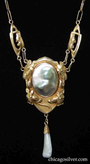 Kalo pendant, gold, on paperclip chain, with applied flowers and vines centering a large blister pearl with shades of green and pink, and small baroque pearl drop