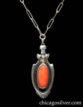 Kalo necklace / pendant, silver, on delicate paperclip chain, with coral.  Arrowhead-shaped pendant with small T-shaped tabs at top, and very small pointed flange at bottom, centering an oval bezel-set coral cabochon stone in a recessed oxidized area.  Three-petal applied blossom with central bead above the stone, and small V-shaped cutout below it.  Small-scale paperclip chain attached to small loop at the top.  Replacement fastener. Very delicate and diminutive, as if for a child.