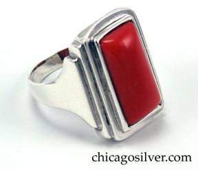 Kalo ring, handwrought in sterling silver with red coral cabochon.  Shank with stepped sides and central red coral cabochon.  Beautiful Deco design.