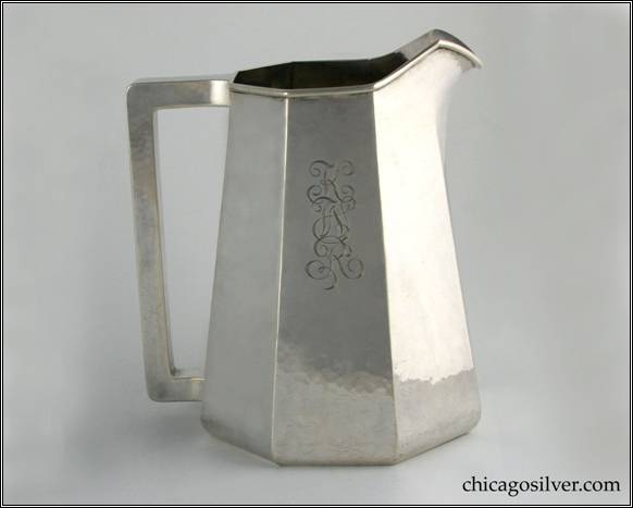 Kalo pitcher, water, paneled, straight-sided paneled form with flat bottom and square hollow handle.  Engraved on underside "Apr. 15, 1916"  Engraved KWR monogram on side in script.  7-1/8" H and 6-1/2" W.  STERLING / HANDWROUGHT / AT / THE KALO SHOPS / CHICAGO / AND / NEW YORK / 18