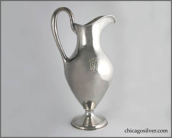 Kalo pitcher, water, large in classical form, applied interlocking RSH monogram on side and sculpted joinery where the lower portion of the looping hollow handle meets the body of the vessel.  14-3/4" H and 8" W.  STERLING / HANDWROUGHT / AT / KALO SHOP / L192