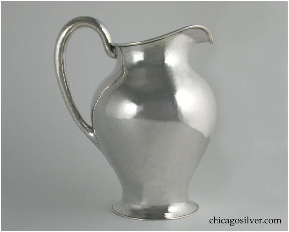 Kalo pitcher, water, nicely hammered surfaces on vase-like form with looping hollow handle and flared foot.  9" H and 7-1/2" W.  STERLING / HANDWROUGHT / AT / THE KALO SHOP / 9 M / 4 PINTS