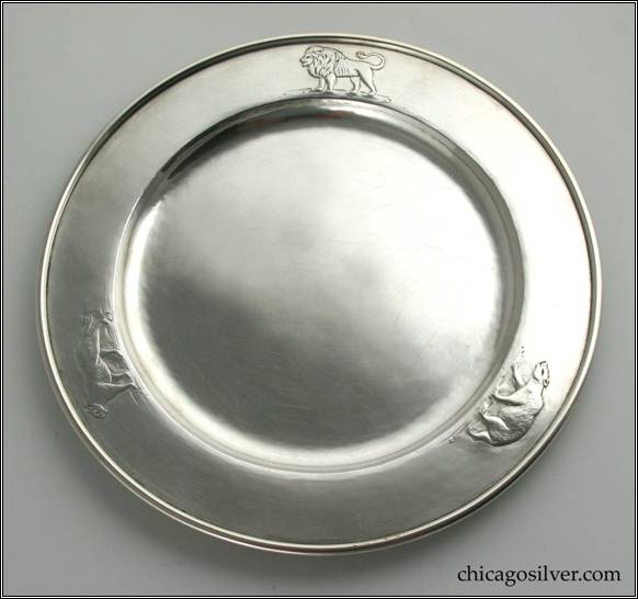 Kalo plate, child's, round, with three repouss animals (lion, cougar, polar bear) on flat raised edge with wire rim, engraved "Bobby's first birthday / from / Grandmother Reynolds" on bottom
