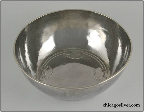 Kalo bowl, early, round, raised form with self-foot and applied wire on rim, chased Prairie-School design inside on bottom
