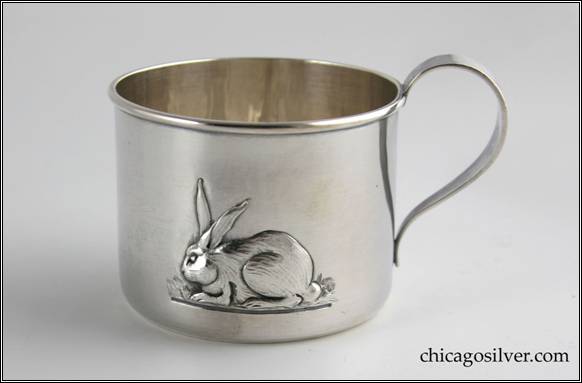 Kalo cup, child's cylindrical, with looping strap handle and applied wire to rim, repouss rabbit on side