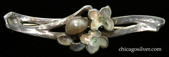 Rokesley bar pin, handwrought in sterling silver, with cluster of blossoms and leaves centering a bezel-set blister pearl.  Enamel embellishments on the flowers and leaves. Textured silver surface, beautifully worked.  