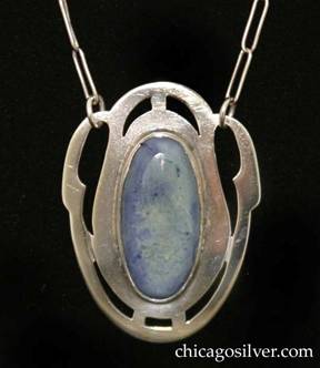 Art Silver Shop pendant on chain, handwrought in sterling silver with pierced geometric frame in sophisticated styling featuring a central dyed light blue mottled agate.  Fine links form a paper clip chain.