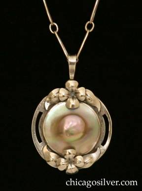 Chicago Art Silver Shop pendant on chain, early, handwrought in sterling silver with pierced round frame centering a large round bezel-set blister pearl, and applied flower and leaves top and bottom.  Fine links form a paper clip chain.  Very delicate.