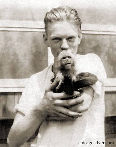Dan Smed with the family capuchin monkey, Goo Goo (a beloved pet who had his own room).