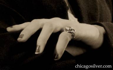 Closeup of ring worn by Elsie Smed Lowry, Peer Smed's youngest daughter, in a modeling shot.