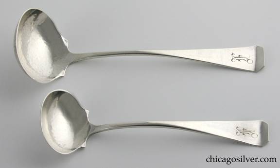 TC Shop sauce ladles, with broad bowls and cut-corner handles, engraved "F" in Gothic style.  One 6" L and 1-13/16" W, the other 7" L and 2-1/4" W. Marked:  THE TC SHOP CHICAGO / HAND WROUGHT / STERLING

