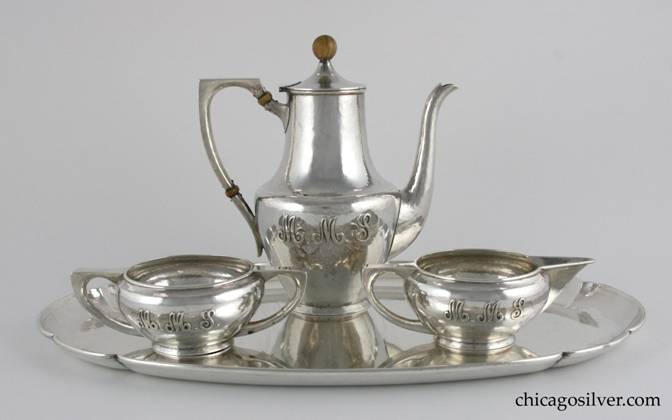 Kalo coffee set, three-piece (3), consisting of coffee pot, cream jug, and sugar bowl, on conforming oval lobed Kalo tray.  