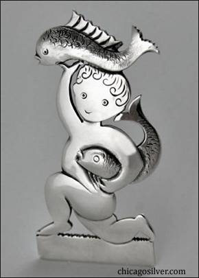 Madeleine Turner sterling pin of kneeling boy with fishes