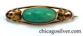 Bar pin, handwrought in 14K gold with central green amazonite cabochon flanked by small grape leaves with nice details.