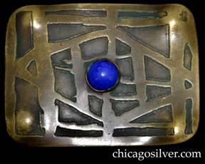 Pin, brass, large, rectangular, with acid-etched geometric design centering bezel-set blue stone.  Four repousse bulges at the corners.  Nice patina.