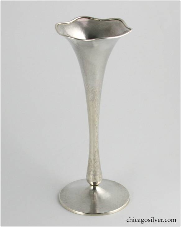 Kalo vase, bud, large, on broad base with flaring, trumpet-form body and ruffled rim with applied wire.  Hammered surface.  Excellent condition.  8" H and 3-1/4" W.  Marked:  G416L / STERLING / HAND WROUGHT / AT / THE KALO SHOPS / CHICAGO / AND / NEW YORK